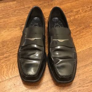 Tod’s Black Leather Loafers
